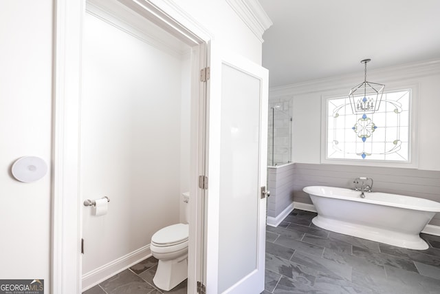10 Rivermont Dr SW, Rome, GA 30165 - bathroom with crown molding, a freestanding tub, and toilet