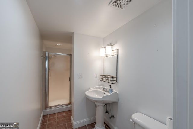 10 Rivermont Dr SW, Rome, GA 30165 - bathroom with tile patterned floors, toilet, baseboards, visible vents, and a shower stall