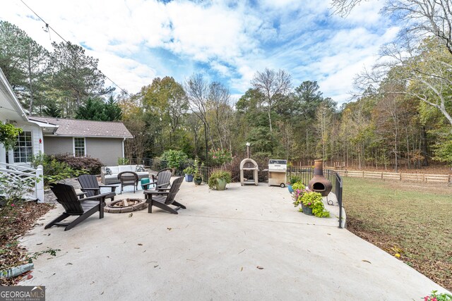 10 Rivermont Dr SW, Rome, GA 30165 - view of patio with fence and an outdoor fire pit