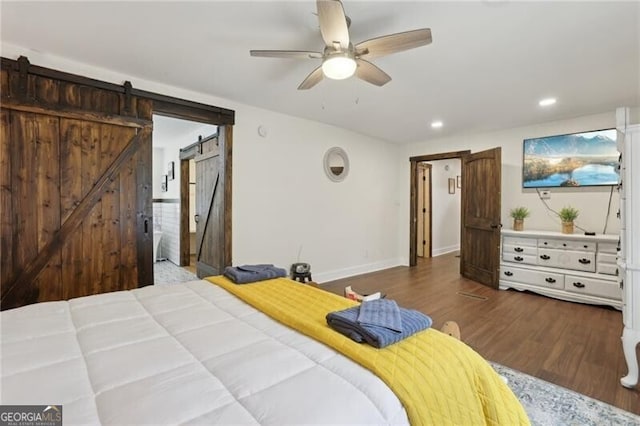 1060 Stephen St, Greensboro, GA 30642 - bedroom with a barn door, wood finished floors, recessed lighting, and a ceiling fan