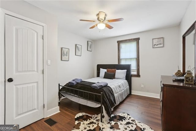 1060 Stephen St, Greensboro, GA 30642 - bedroom featuring wood finished floors and a ceiling fan