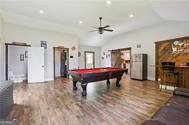 1060 Stephen St, Greensboro, GA 30642 - playroom featuring lofted ceiling, a ceiling fan, billiards, wood finished floors, and a barn door