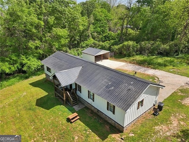 1060 Stephen St, Greensboro, GA 30642 - aerial view of property and surrounding area featuring a heavily wooded area