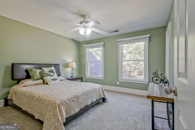 671 Ellison Rd, Tyrone, GA 30290 - bedroom with carpet floors and ceiling fan