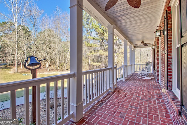 671 Ellison Rd, Tyrone, GA 30290 - covered porch with a ceiling fan