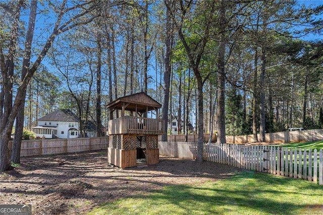 view of yard with a fenced backyard