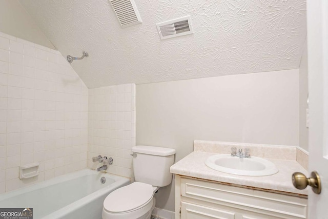 full bath with lofted ceiling, visible vents, a textured ceiling, and toilet