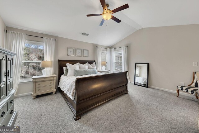 213 Roseman Way, Woodstock, GA 30188 - bedroom with vaulted ceiling, light colored carpet, baseboards, and a ceiling fan
