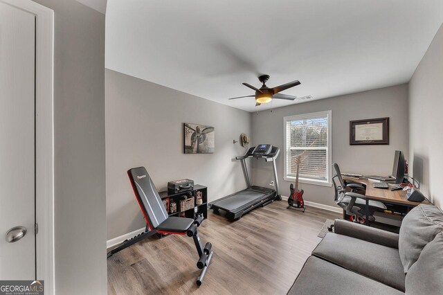 213 Roseman Way, Woodstock, GA 30188 - workout area with a ceiling fan, wood finished floors, and baseboards
