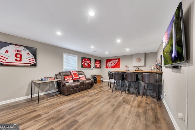 213 Roseman Way, Woodstock, GA 30188 - indoor bar with wood finished floors, baseboards, and recessed lighting