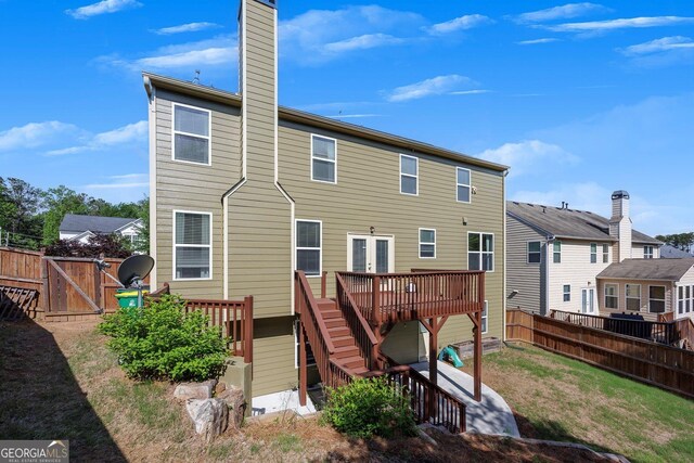 213 Roseman Way, Woodstock, GA 30188 - rear view of property with a deck, a chimney, stairs, and a gate
