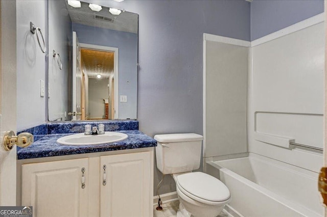bathroom with shower / washtub combination, visible vents, toilet, vanity, and baseboards