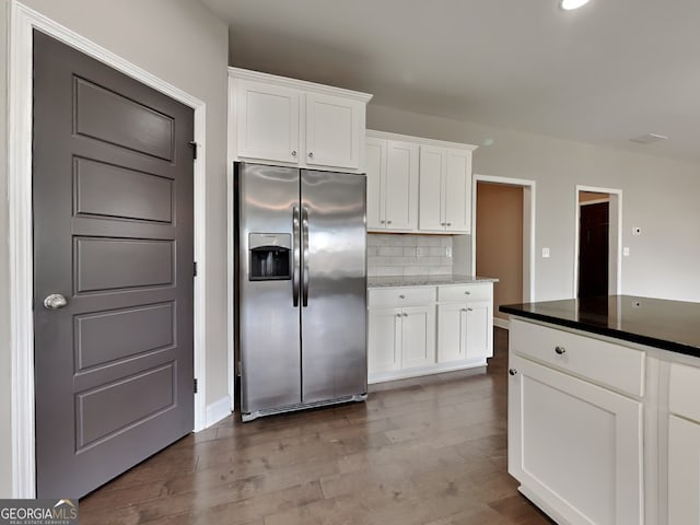 1820 Cobblefield Cir, Dacula, GA 30019 - kitchen featuring stainless steel fridge with ice dispenser, tasteful backsplash, white cabinets, and dark wood-type flooring