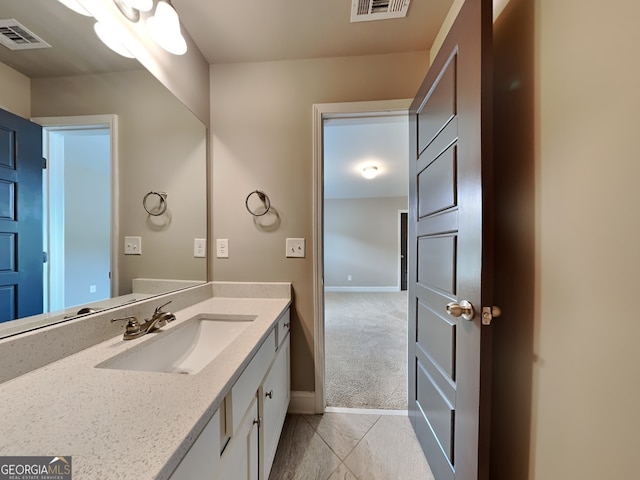 1820 Cobblefield Cir, Dacula, GA 30019 - bathroom featuring vanity, baseboards, and tile patterned flooring