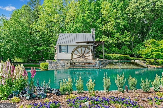 pool with an outdoor structure
