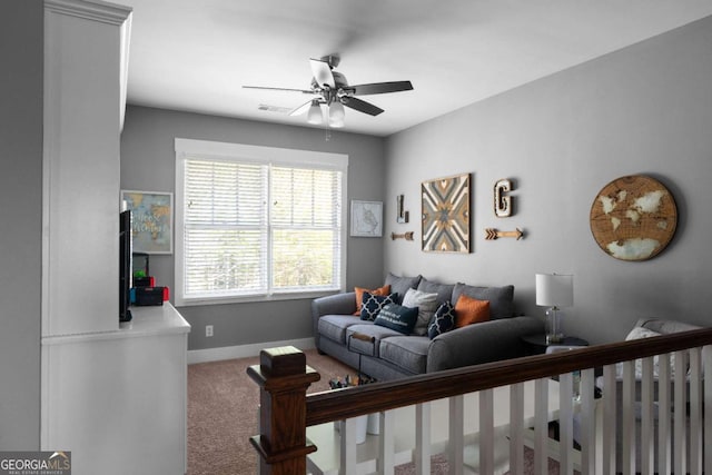 9988 Devonshire St, Douglasville, GA 30135 - living room featuring visible vents, carpet, ceiling fan, and baseboards