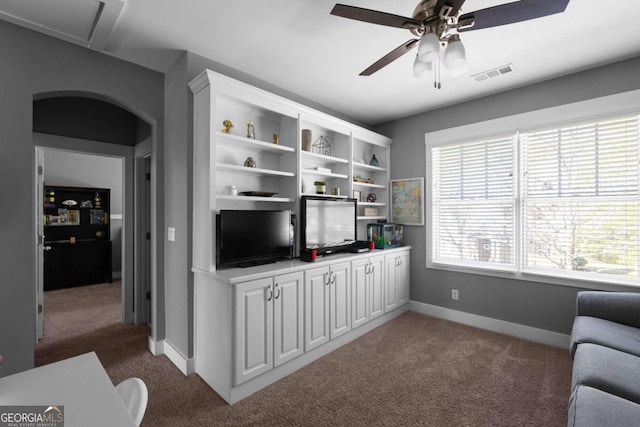 9988 Devonshire St, Douglasville, GA 30135 - carpeted living area with visible vents, a ceiling fan, and baseboards