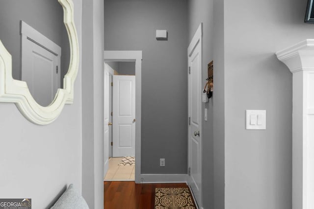 9988 Devonshire St, Douglasville, GA 30135 - hallway with baseboards and wood finished floors