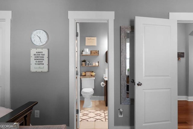 9988 Devonshire St, Douglasville, GA 30135 - bathroom featuring toilet and baseboards