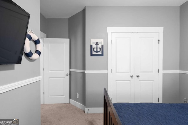 9988 Devonshire St, Douglasville, GA 30135 - carpeted bedroom featuring baseboards
