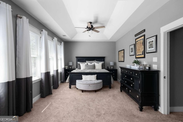 9988 Devonshire St, Douglasville, GA 30135 - bedroom featuring baseboards, a raised ceiling, ceiling fan, and light carpet