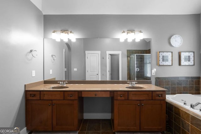 9988 Devonshire St, Douglasville, GA 30135 - bathroom with a garden tub, a sink, double vanity, and a shower stall