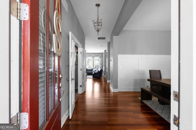 9988 Devonshire St, Douglasville, GA 30135 - hall with a wainscoted wall, wood finished floors, and visible vents
