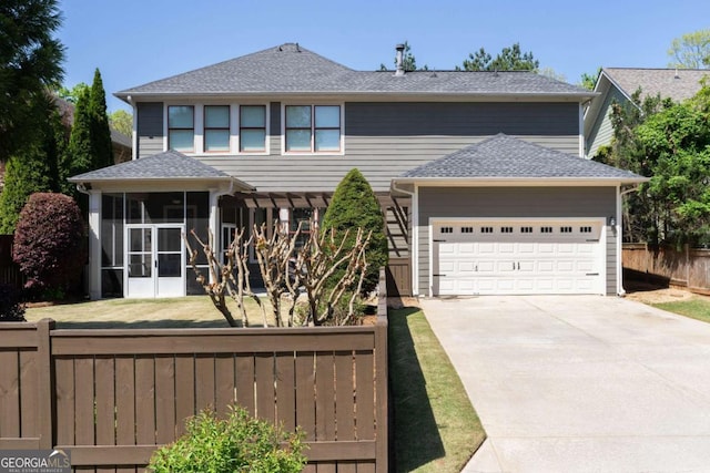 9988 Devonshire St, Douglasville, GA 30135 - traditional-style home with fence, an attached garage, a shingled roof, a sunroom, and concrete driveway