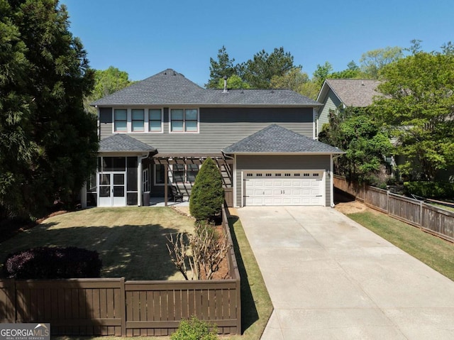 9988 Devonshire St, Douglasville, GA 30135 - traditional-style home with a sunroom, a front lawn, an attached garage, and fence