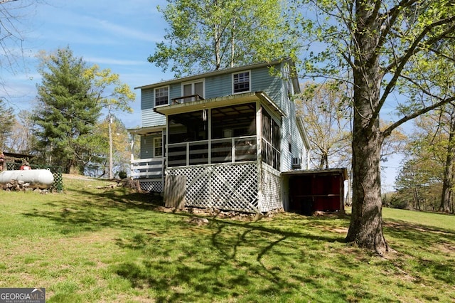 329 Ed King Rd, Blairsville, GA 30512 - rear view of property with a lawn and a sunroom