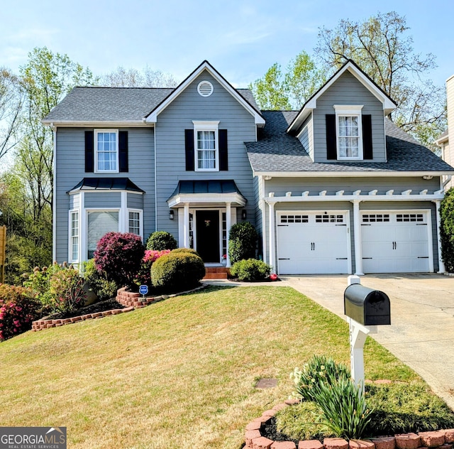 1581 Shetland Pony Ct NW, Suwanee, GA 30024 - view of front facade featuring concrete driveway, a front yard, a shingled roof, and an attached garage