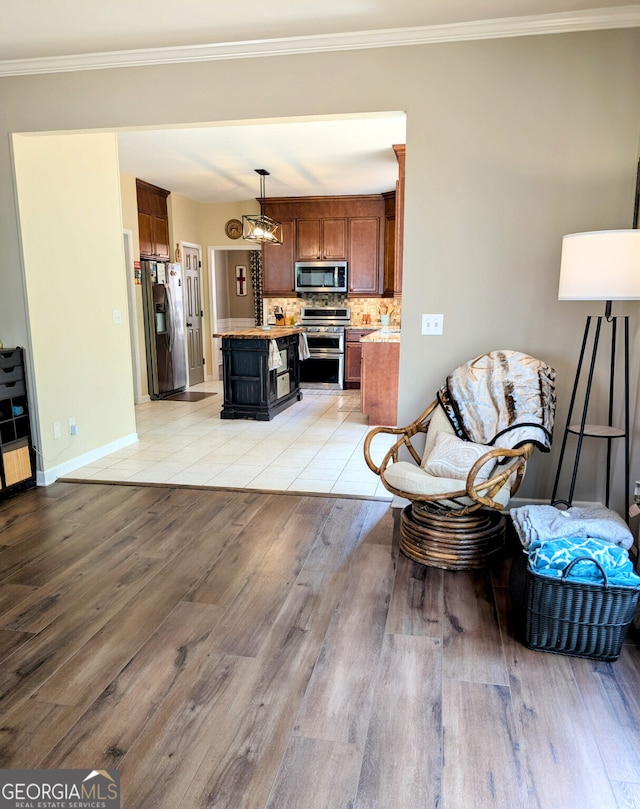 1581 Shetland Pony Ct NW, Suwanee, GA 30024 - living area with light wood finished floors, baseboards, and ornamental molding