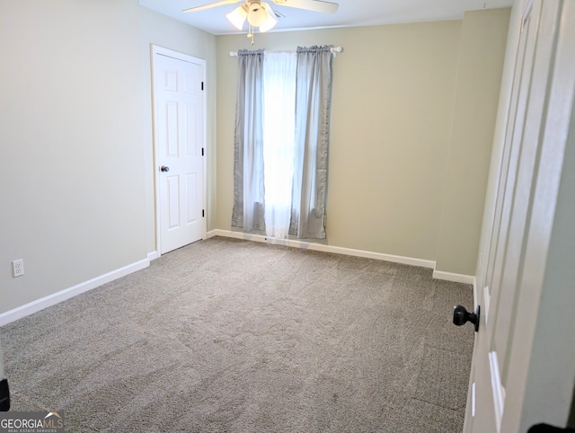 1581 Shetland Pony Ct NW, Suwanee, GA 30024 - empty room featuring ceiling fan, baseboards, and carpet