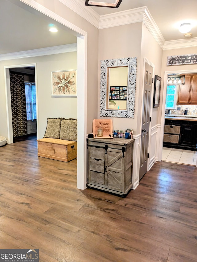 1581 Shetland Pony Ct NW, Suwanee, GA 30024 - hall featuring light wood-style flooring and crown molding
