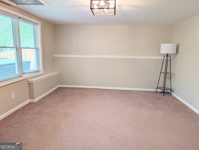 1581 Shetland Pony Ct NW, Suwanee, GA 30024 - carpeted spare room with baseboards