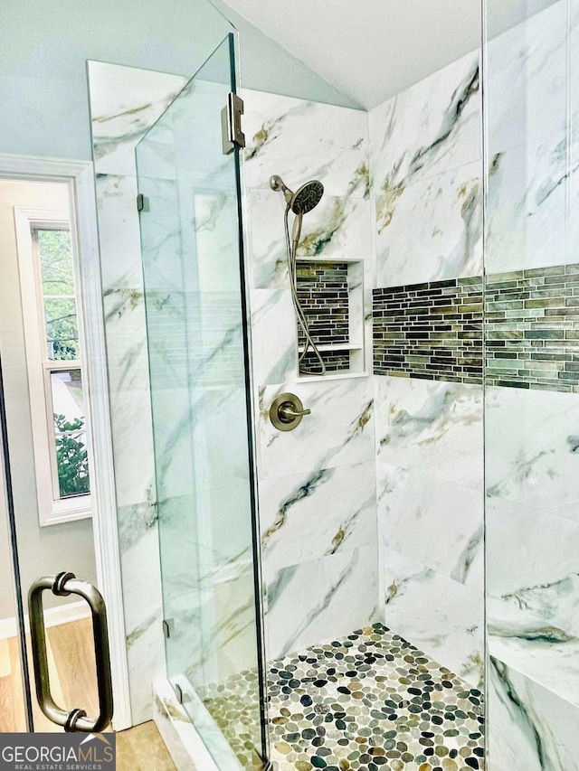 7675 Lanier View Rdg, Cumming, GA 30041 - full bath featuring a marble finish shower and vaulted ceiling
