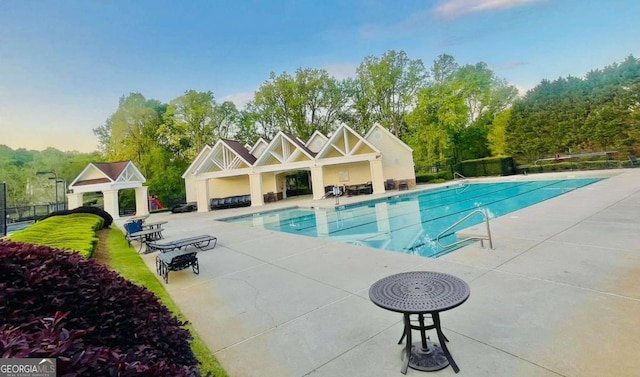 7675 Lanier View Rdg, Cumming, GA 30041 - community pool featuring a patio