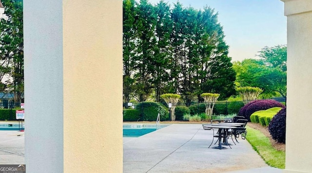 7675 Lanier View Rdg, Cumming, GA 30041 - community pool featuring a patio area