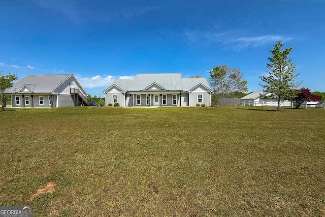 5 Gibson Rd, Newnan, GA 30263 - view of front of home featuring a front lawn and metal roof