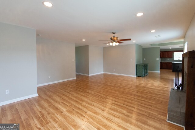 5 Gibson Rd, Newnan, GA 30263 - unfurnished room featuring ceiling fan, recessed lighting, light wood-style floors, baseboards, and a sink