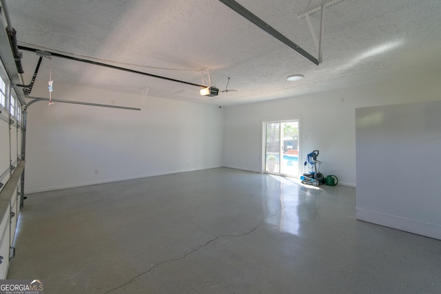 5 Gibson Rd, Newnan, GA 30263 - garage with a garage door opener and baseboards