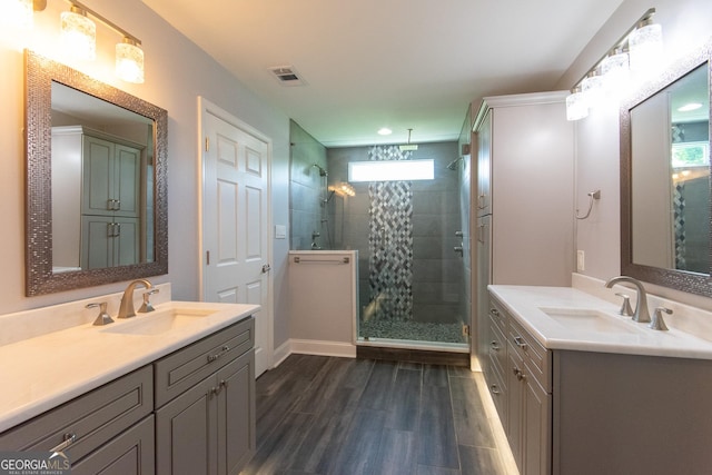 5 Gibson Rd, Newnan, GA 30263 - full bath with a shower stall, wood finished floors, and two vanities