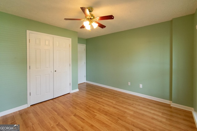 5 Gibson Rd, Newnan, GA 30263 - unfurnished bedroom featuring light wood-style floors, a closet, and baseboards