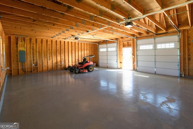 5 Gibson Rd, Newnan, GA 30263 - garage featuring a garage door opener and electric panel