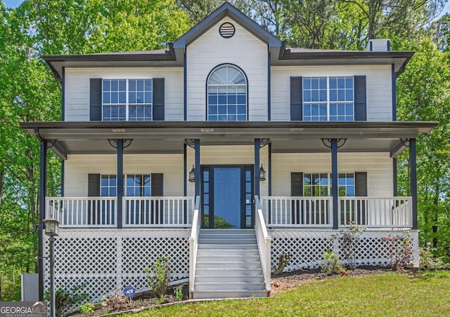1331 Windage Ct SW, Marietta, GA 30008 - view of front of house featuring covered porch and a chimney