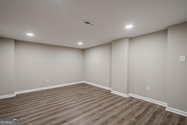 1331 Windage Ct SW, Marietta, GA 30008 - finished below grade area with dark wood-style floors and recessed lighting