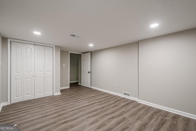 1331 Windage Ct SW, Marietta, GA 30008 - unfurnished bedroom with wood finished floors, recessed lighting, and a closet