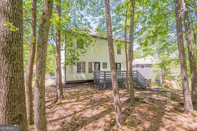 1331 Windage Ct SW, Marietta, GA 30008 - rear view of house with a wooden deck