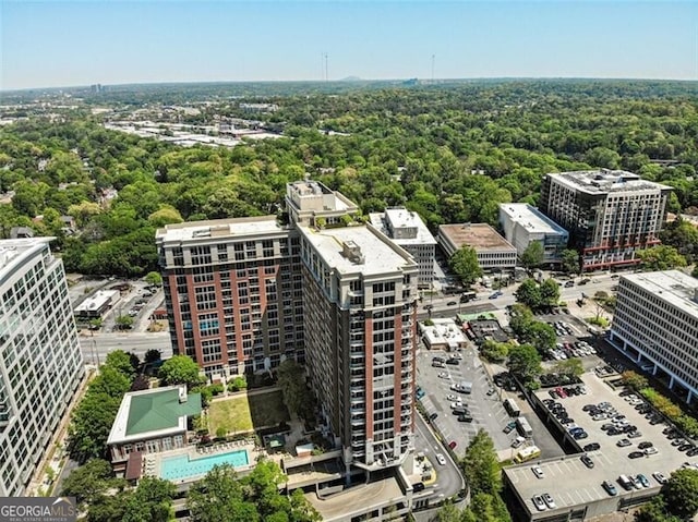 bird's eye view with a forest view