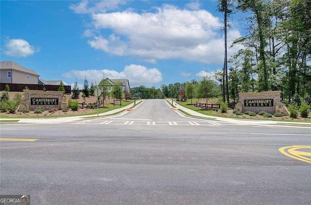 view of road featuring curbs and sidewalks